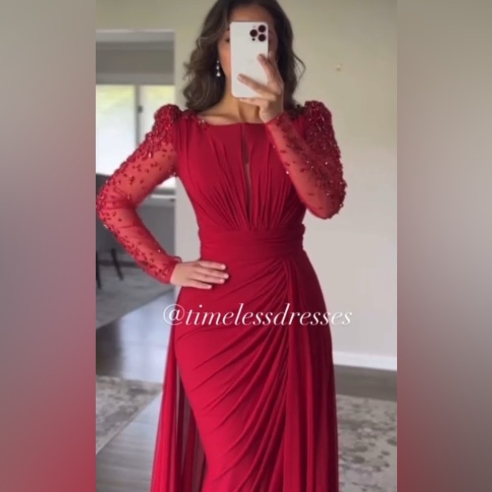 Red dress is very modest and of good quality, It's in very good condition